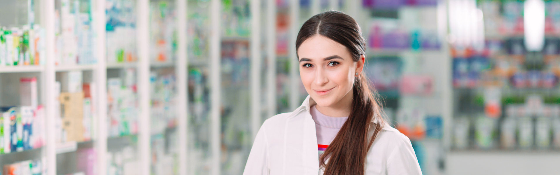 Female pharmacist smiling